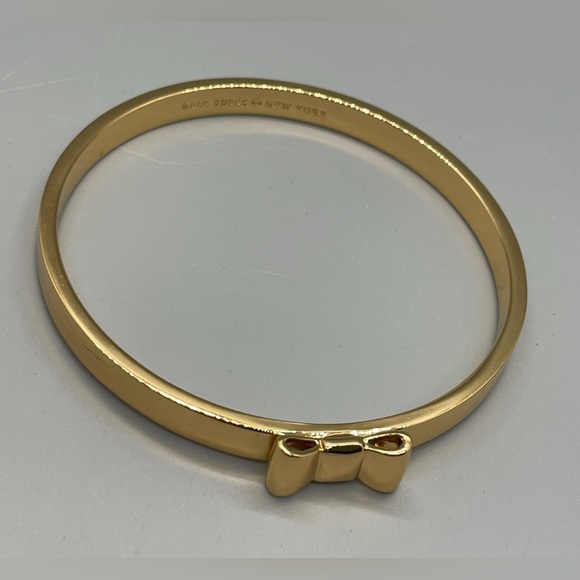 KATE SPADE TAKE A BOW GOLD TONE METAL BANGLE BRACELET Feminine Dressy Dainty - Picture 3 of 7